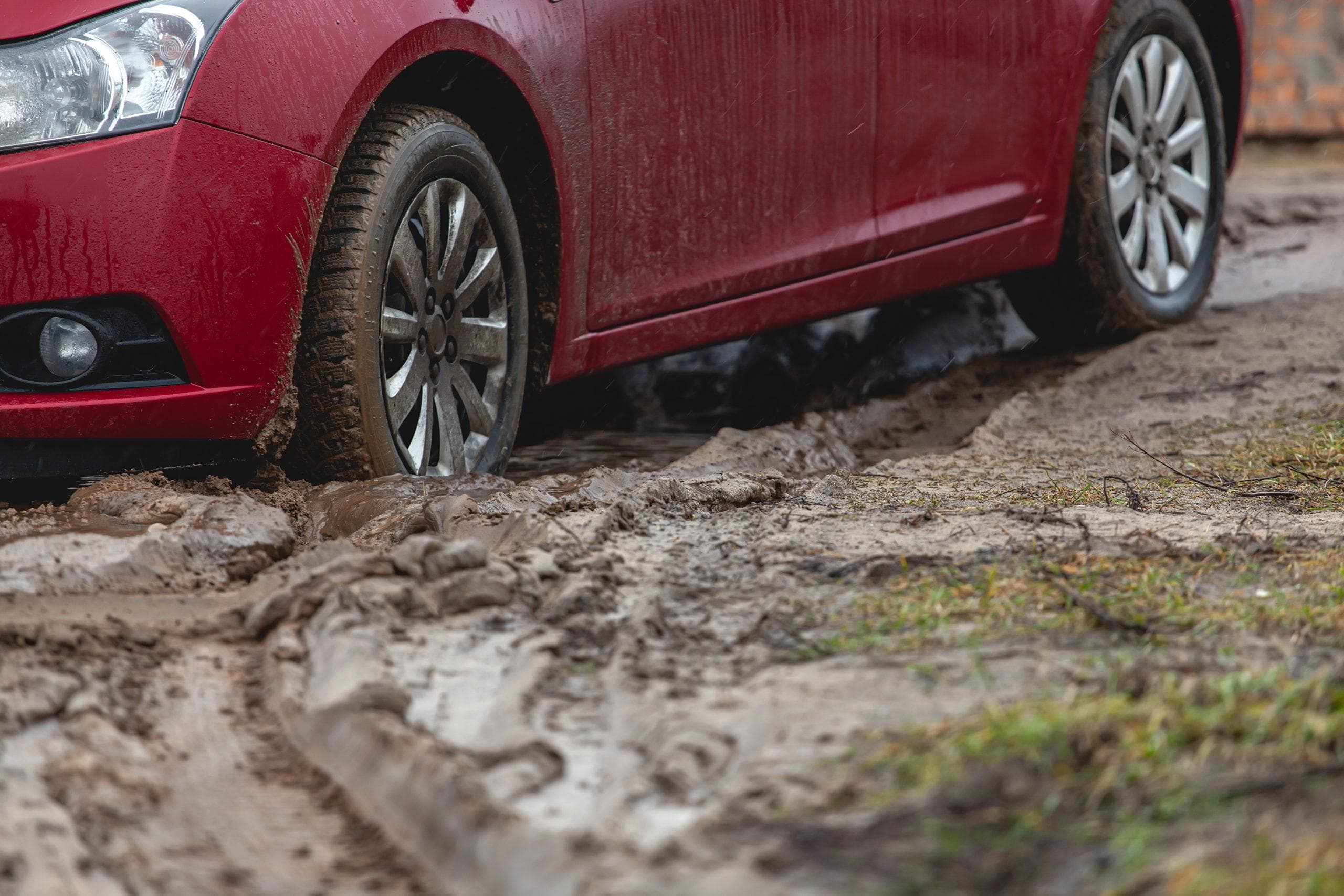 Auto uit modder of zand